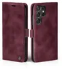 A burgundy flip case for a smartphone is shown from two angles, open and closed. Produktbild-Vorschau