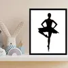 A framed picture of a ballerina in a black tutu is displayed on a shelf next to children's toys. Anteprima dell’immagine prodotto