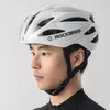 A man wearing a white bicycle helmet. Produktbild-Vorschau