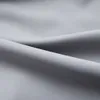 A close-up, abstract view of gray fabric, showing its texture and folds. Produktbild-Vorschau