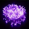 A close-up shot of a tangled bundle of purple LED string lights against a black background. Produktbild-Vorschau
