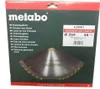 The image shows the packaging of a Metabo circular saw blade. The packaging is dark green with red accents and features the Metabo logo and product details. Náhled obrázku produktu