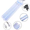 A product shot of multiple LED light strings and power adapters. Produktbild-Vorschau