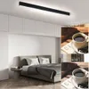 A bedroom with a modern linear ceiling light and inset images showing a cup of coffee. Náhľad obrázku produktu