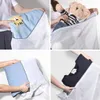 A collage of four images showing how to use laundry bags to store various items like blankets, stuffed animals, pillows, and clothes. Produktbild-Vorschau