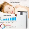 A sleeping child lies next to an air purifier with graphics detailing its features. Produktbild-Vorschau