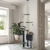 A cat tree is set up in a well-lit room with large windows and a plant. Produktbild-Vorschau