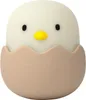 A cute cartoon chick hatching from an egg. Produktbild-Vorschau
