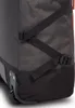 A close-up of the bottom corner of a rolling suitcase, showing the wheels and straps. Náhľad obrázku produktu