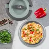 A top-down view of a lunch thermos with food and ingredients. Voir les images du produit