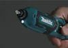 A hand holds a Makita cordless screwdriver with a built-in LED light. Podgląd zdjęcia produktu