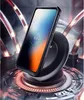 A smartphone in a protective case is shown wirelessly charging on a futuristic-looking charging pad, surrounded by glowing red and blue lights and metallic structures. Náhled obrázku produktu