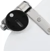 A close-up view of a toilet seat hinge mechanism. Voir les images du produit