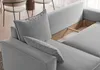 Close-up of a gray sectional sofa with an open storage compartment. Produktbild-Vorschau