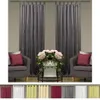 Two chairs with decorative pillows and a vase of flowers in front of gray curtains. Anteprima dell’immagine prodotto