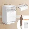 A diagram showing the dimensions of a white nightstand, with a silhouette of a person for scale. Náhled obrázku produktu