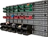 A wall-mounted storage system with various bins filled with small items. Produktbild-Vorschau