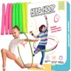 A product image for a hula hoop set, featuring children using the hoops and the product packaging. Produktbild-Vorschau