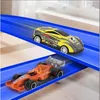 Two toy race cars on a blue track. Produktbild-Vorschau