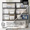 Shelving units filled with various transparent storage boxes. Produktbild-Vorschau