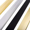 Four different colored metal strips arranged diagonally on a white background. Produktbild-Vorschau