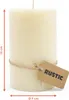 A cream-colored pillar candle with a rustic tag and twine. Anteprima dell’immagine prodotto