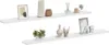Two white floating shelves are displayed against a white background, each adorned with various decorative items. Náhled obrázku produktu