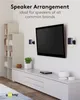 A living room setup with a TV and speakers mounted on the wall, and a media console below. Podgląd zdjęcia produktu