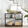 A black console table with decorative items and storage baskets is placed in a hallway next to a staircase. Podgląd zdjęcia produktu