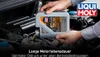 A person is pouring oil from a Liqui Moly bottle into an engine. Produktbild-Vorschau