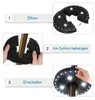 Schwarzes OYOCO LED-Schirmlicht, das geöffnet, an einer Schirmstange befestigt und eingeschaltet wird Anteprima dell’immagine prodotto