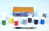 A set of paint pots and a box of paints are arranged on a white surface, with a pen in the foreground. Produktbild-Vorschau