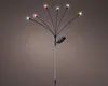 A solar-powered garden light with multiple colored LED bulbs on flexible stems. Produktbild-Vorschau