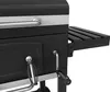 A close-up view of a black charcoal grill with silver accents and a side shelf. Podgląd zdjęcia produktu