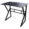 A black gaming computer desk with a metal frame and two cable management holes on the surface. Náhled obrázku produktu