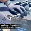 Hands wearing gloves are filing a metal profile. Produktbild-Vorschau