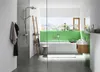 A modern bathroom with a shower, bathtub, and sink, featuring green tiled walls and a wooden vanity. Anteprima dell’immagine prodotto