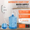 Collage showcasing an automatic water supply system, highlighting its features with text and icons. A blue water bottle with a pump is the central focus, with a control unit mounted on a wall. Anteprima dell’immagine prodotto
