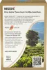 The back of a Nescafé product box with marketing text and an image of a coffee plantation. Produktbild-Vorschau