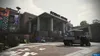 A science center building with a golf cart in front. Produktbild-Vorschau