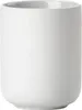 A plain white ceramic toothbrush holder. Produktbild-Vorschau