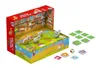 A board game with farm animal pieces and game cards, set up on a table. Produktbild-Vorschau