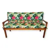 A wooden bench with colorful floral cushions against a white background. Produktbild-Vorschau