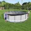 Two people are putting a cover on an above-ground swimming pool in a grassy backyard. Produktbild-Vorschau