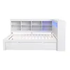 A white bed frame with a bookcase headboard and integrated LED lighting. Produktbild-Vorschau