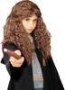 A young girl dressed as Hermione Granger from Harry Potter, holding a wand. Produktbild-Vorschau