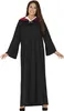 A woman is posing in a black robe with a red hood lining and a white collar. Produktbild-Vorschau
