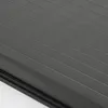 A close-up view of a dark gray pleated blind with horizontal lines. Produktbild-Vorschau