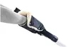 A person's arm wearing a grey sleeve is inserted into a black stroller hand warmer with a white fuzzy lining. Náhľad obrázku produktu