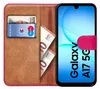 A book-style phone case with a Samsung Galaxy A17 5G phone inside, showing slots for cards and cash. Produktbild-Vorschau
